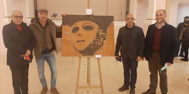 Luigi Cozzoli, Massimiliano Sanna e Francesco Obino con Antonio Giovanni