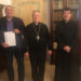 Anthony Muroni, l'Arcivescovo Roberto Carboni e Mons. Giuseppe Sanna