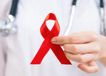 Fiocco rosso lotta contro l'Aids. ? Depositphotos