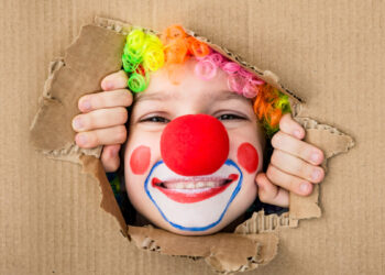 Bambino clown carnevale. 📷 Depositphotos