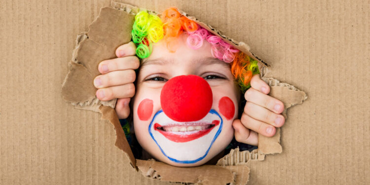 Bambino clown carnevale. 📷 Depositphotos