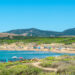 La spiaggia di Porto Ferro. ? Depositphotos