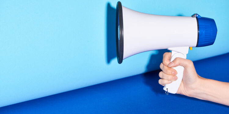 Megafono bando concorso. ? Depositphotos