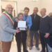 Giannetta Marongiu insieme ai figli Augusto, Carlo e Pierfranco e all'assessore Ivano Cuccu
