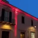 Palazzo del Marchese a Porto Torres illuminato di rosa