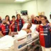 Yael Trepy dona maglie del Cagliari Calcio a equipe Terapia intensiva dell'ospedale Santissima Annunziata di Sassari